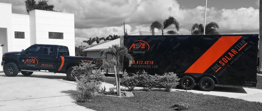 AllSolar Energy service truck and The Solar Team trailer — electric, hot water, pools